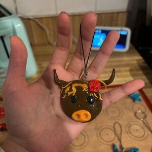 Brown Bull Keychain with Red and Orange Accents